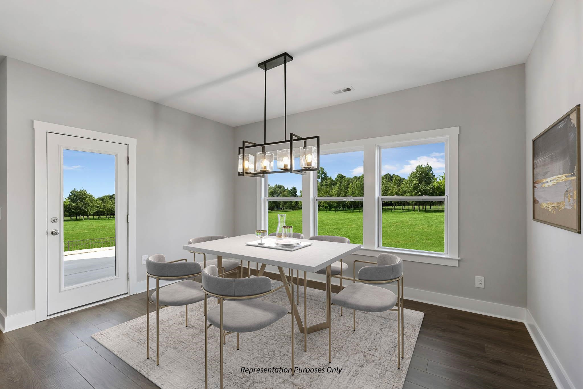 142 Beacon Hl Road Lillington, NC 27546 - Photo 18 of 38 a dining room with furniture a chandelier and wooden floor
