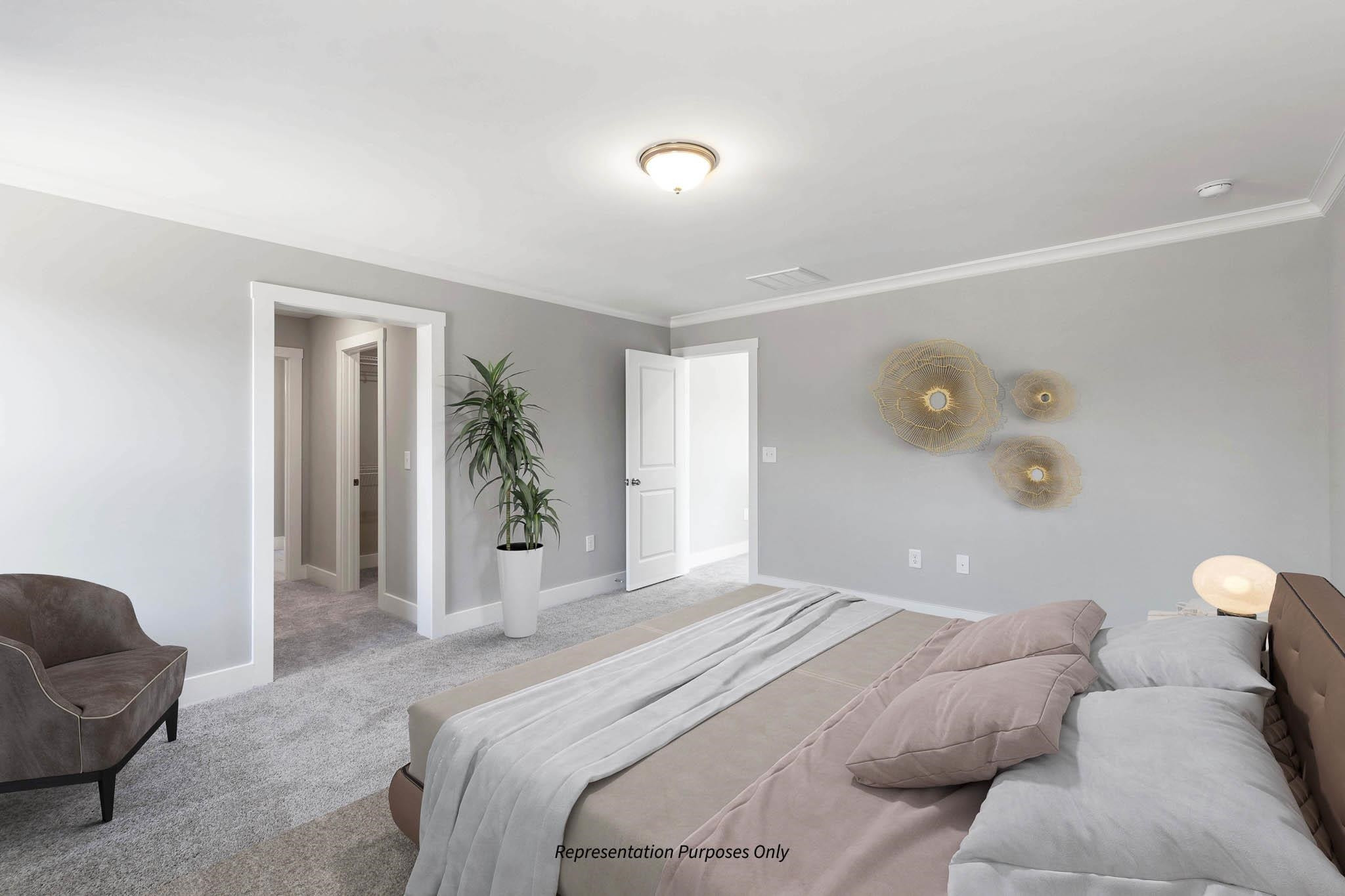 142 Beacon Hl Road Lillington, NC 27546 - Photo 21 of 38 a bedroom with a bed and a couch