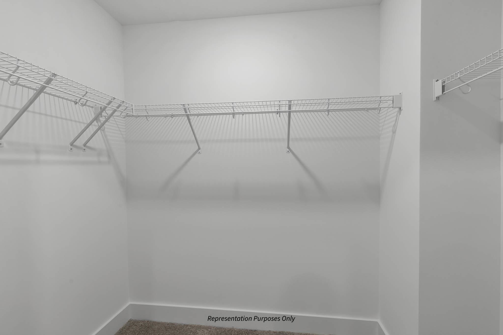 142 Beacon Hl Road Lillington, NC 27546 - Photo 25 of 38 a view of a room with racks on the wall