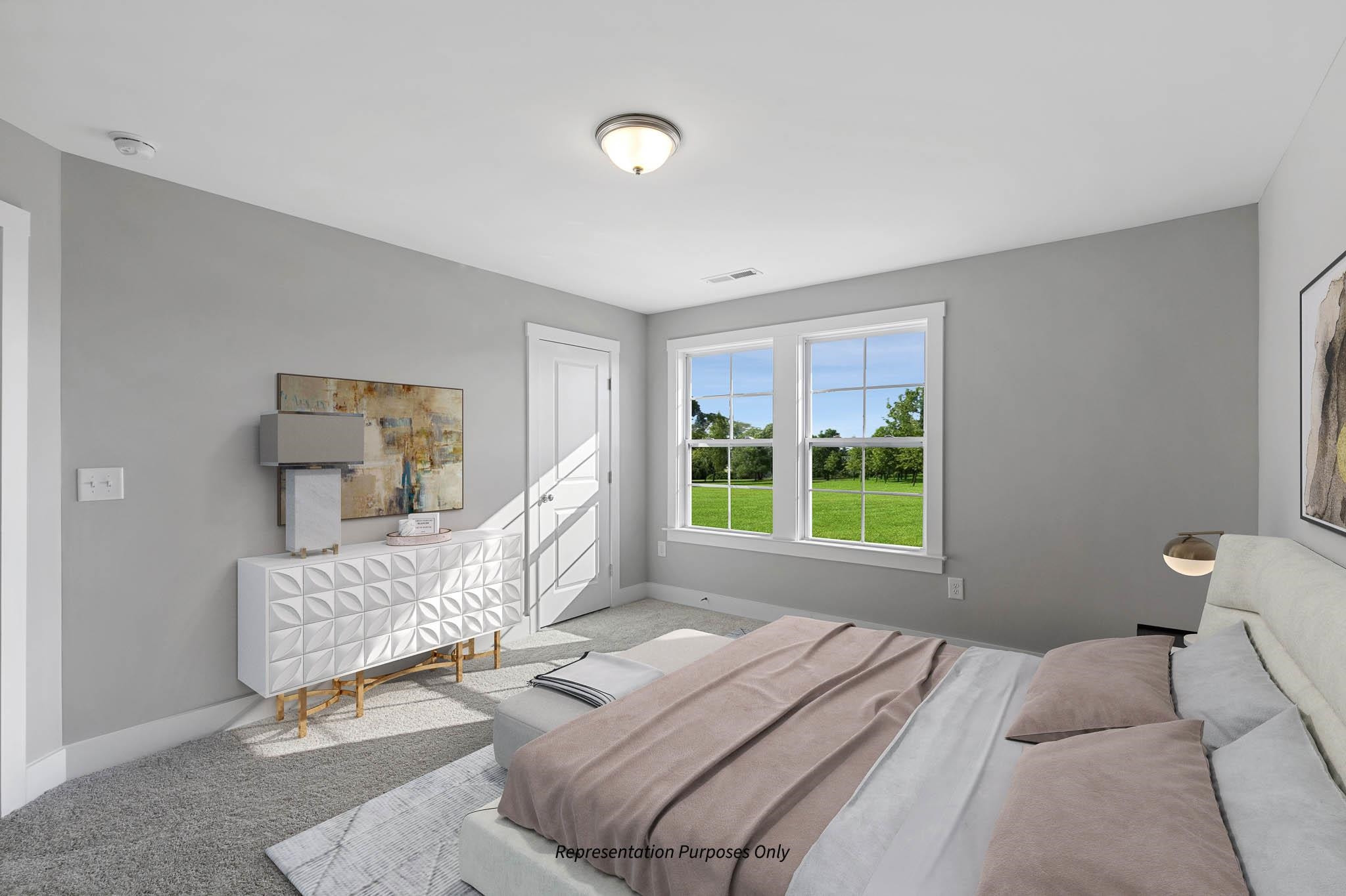 142 Beacon Hl Road Lillington, NC 27546 - Photo 28 of 38 a bed sitting in a bedroom next to a window