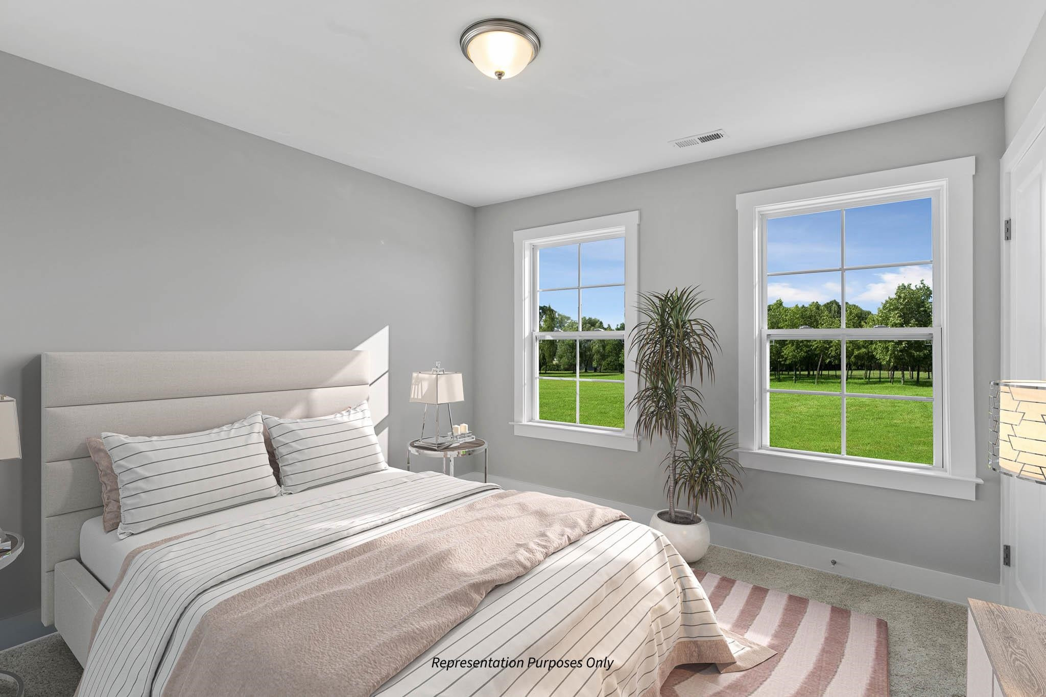 142 Beacon Hl Road Lillington, NC 27546 - Photo 33 of 38 a bedroom with a bed and a large window