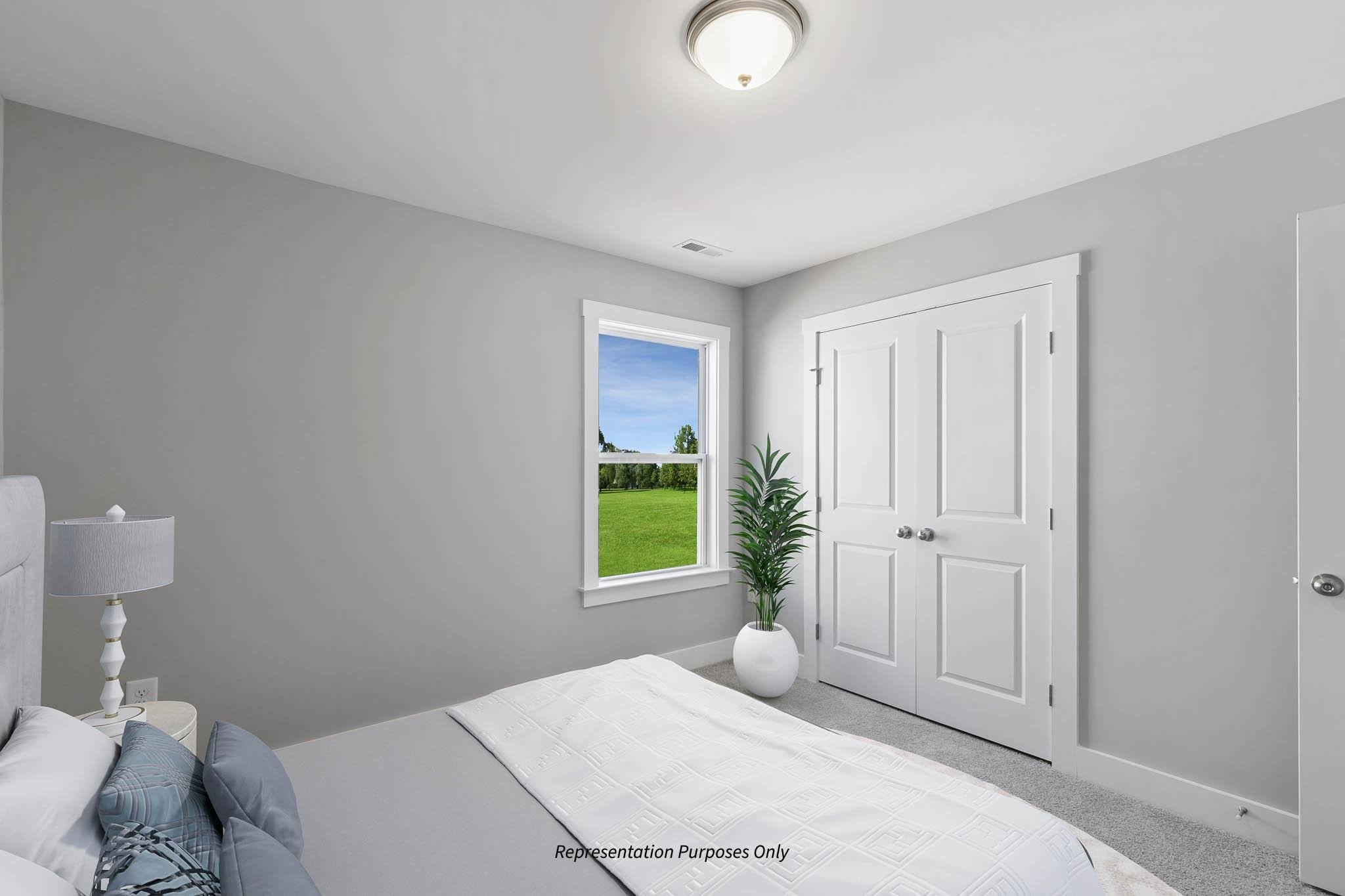 142 Beacon Hl Road Lillington, NC 27546 - Photo 37 of 38 a bedroom with a bed and a window