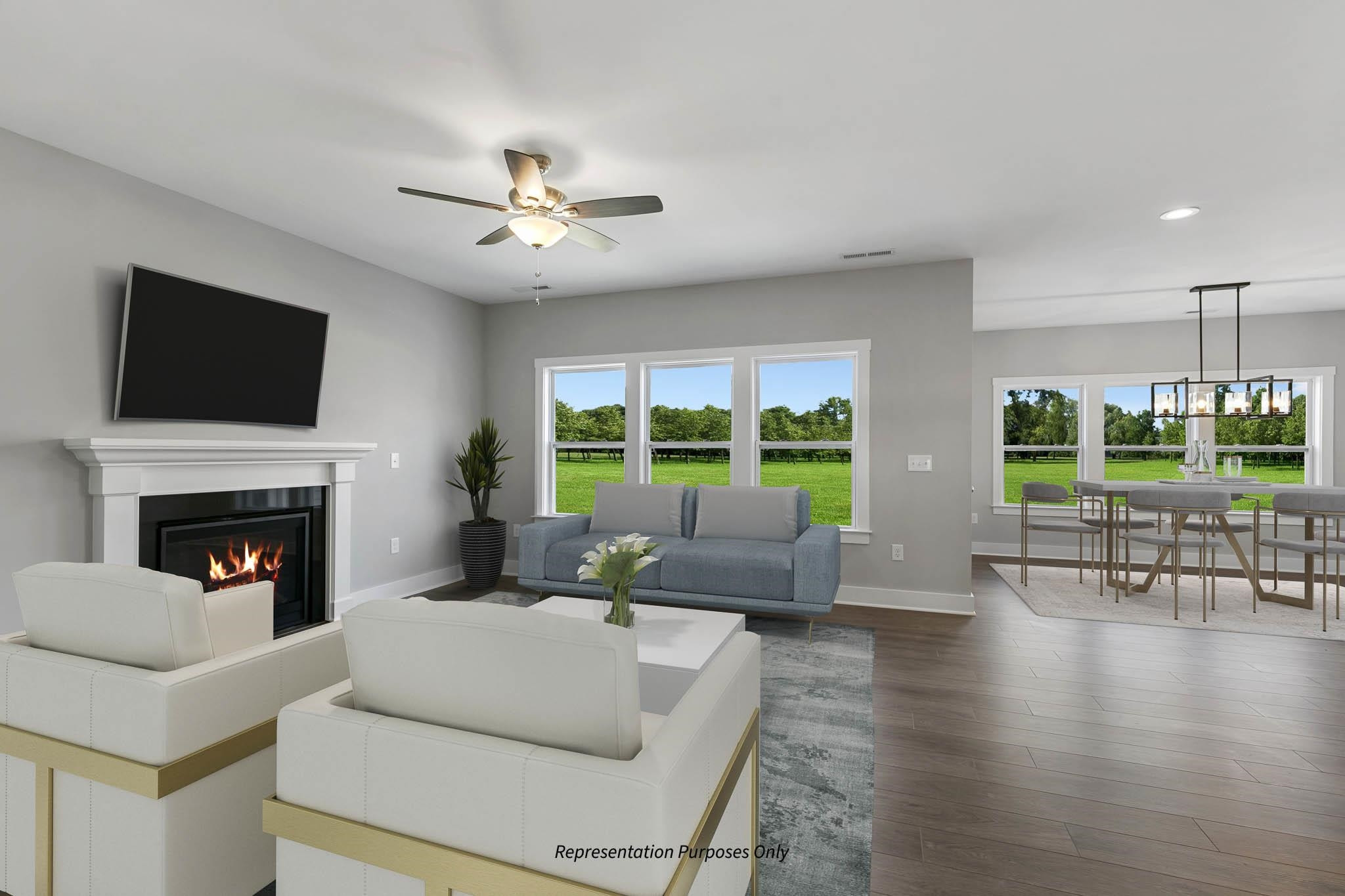142 Beacon Hl Road Lillington, NC 27546 - Photo 9 of 38 a living room with furniture fireplace and a large window