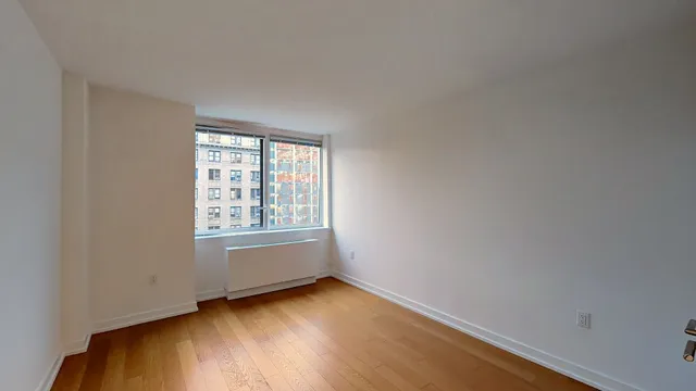 a bedroom with a bed and furniture