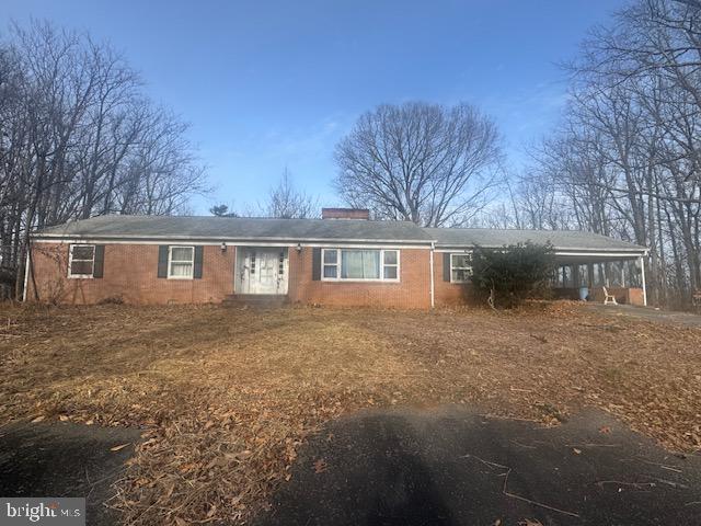 a front view of a house with yard