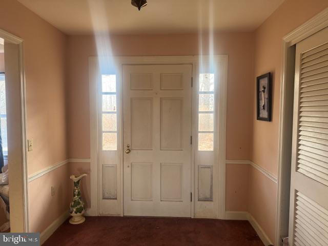 732 Courthouse Mountain Road Madison, VA 22727 - Photo 6 of 7 an empty room with wooden floor and windows