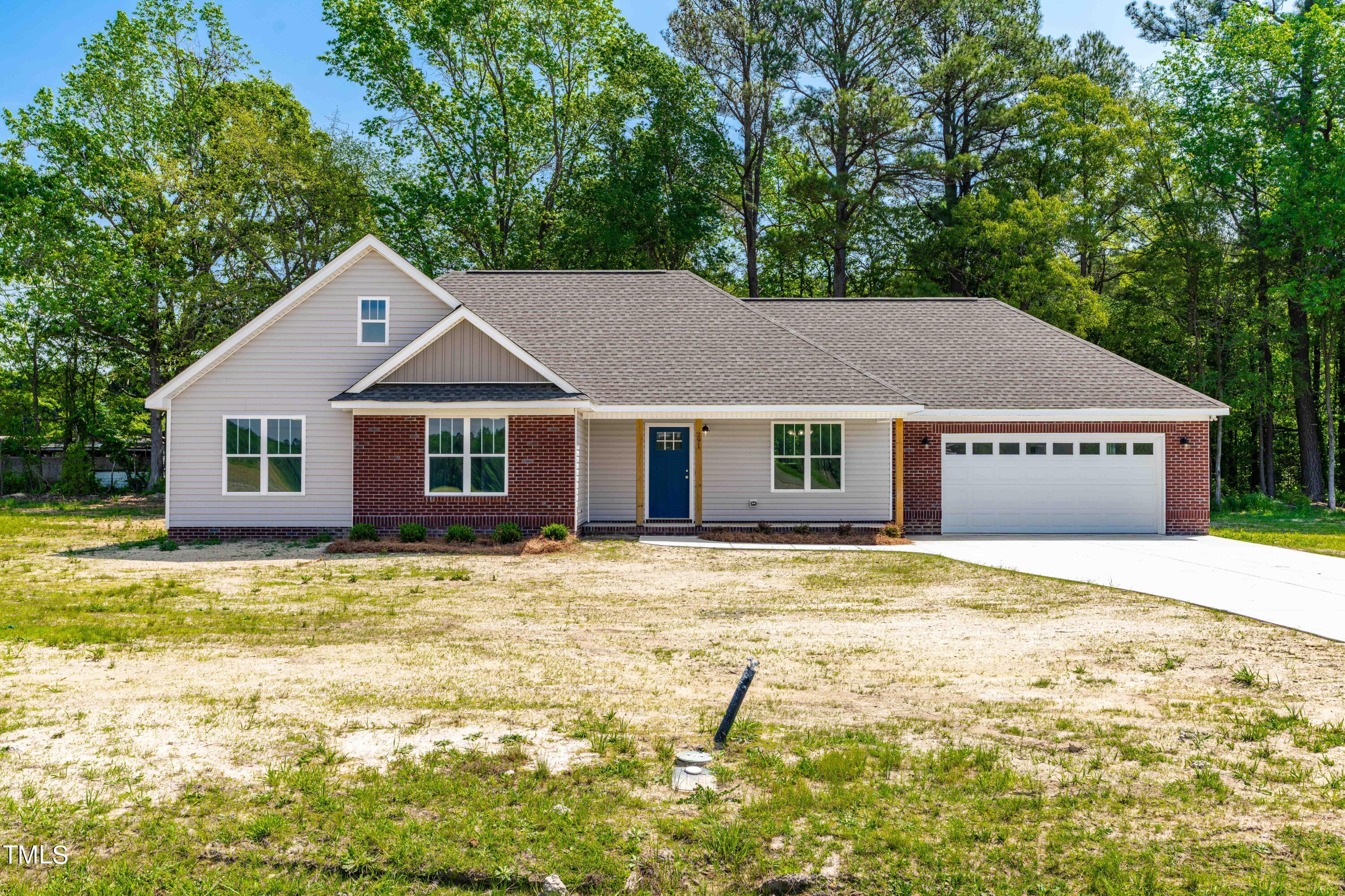 291 Wiggs Road Selma, NC 27576 - Photo 1 of 21 Front with Brick Accents