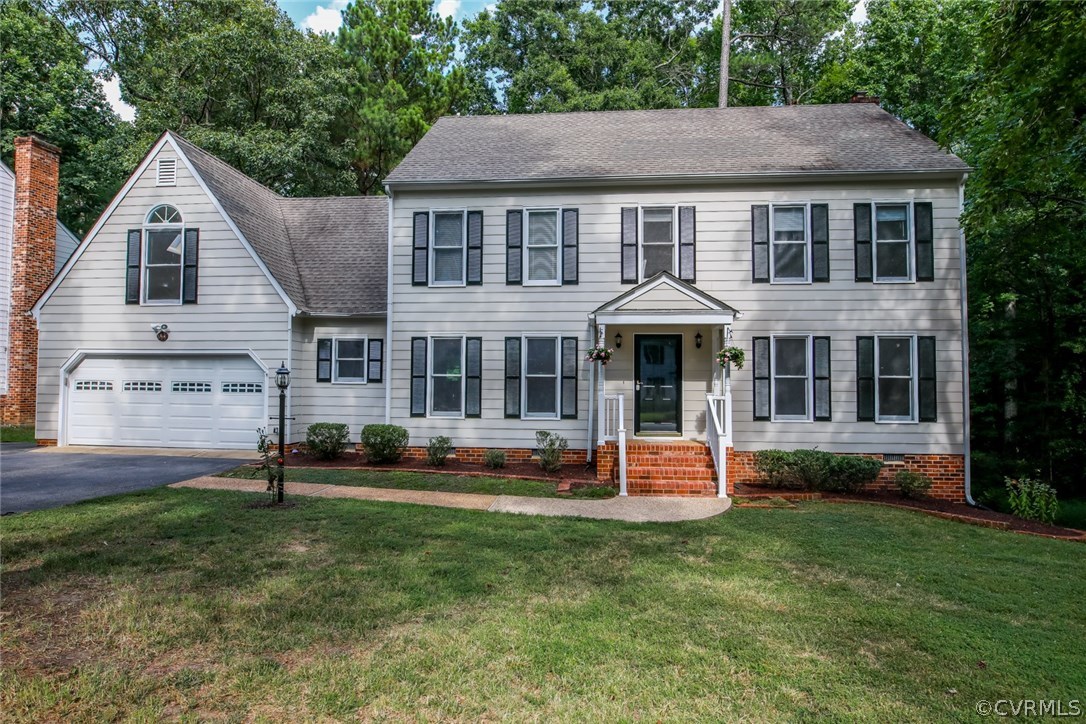 3003 Cove Ridge Road Midlothian, VA 23112 - Photo 33 of 33 a front view of a house with a yard