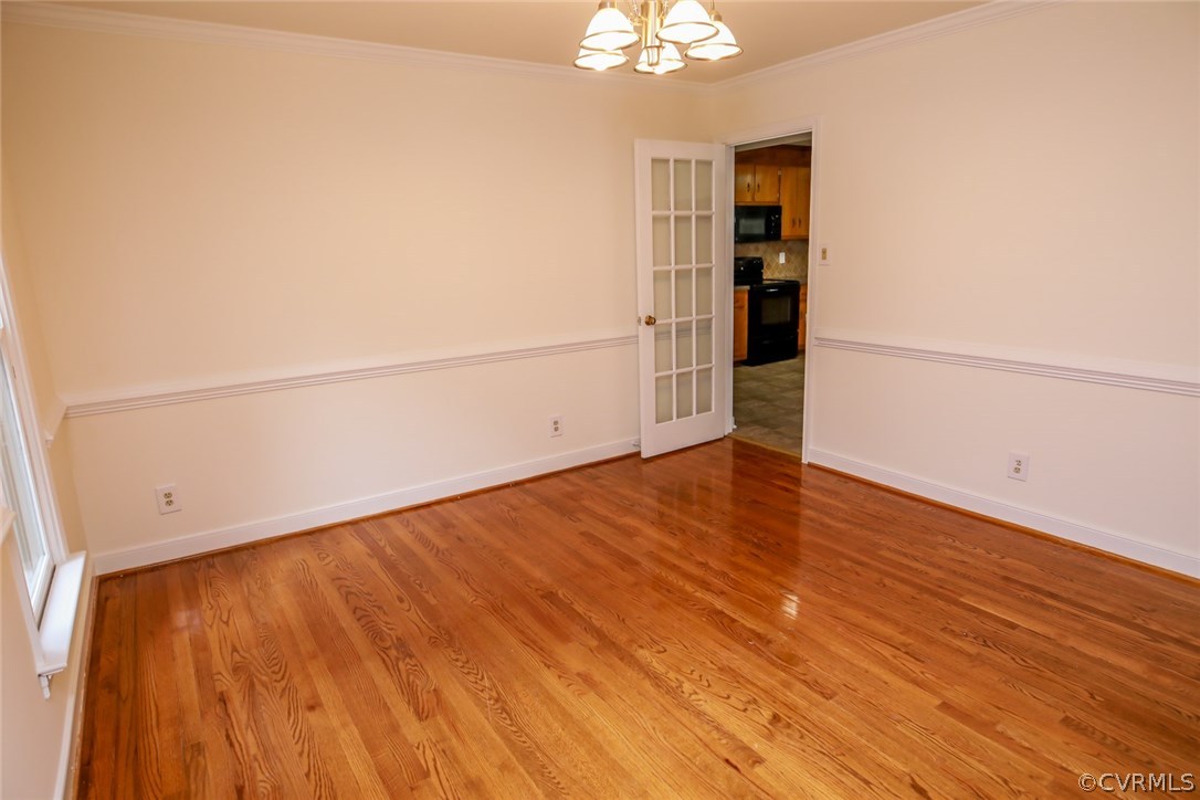3003 Cove Ridge Road Midlothian, VA 23112 - Photo 4 of 33 an empty room with wooden floor