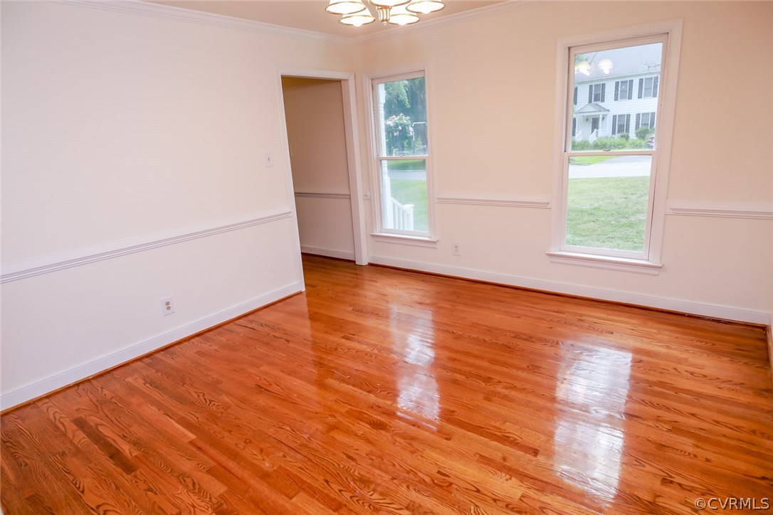 3003 Cove Ridge Road Midlothian, VA 23112 - Photo 5 of 33 an empty room with wooden floor and windows