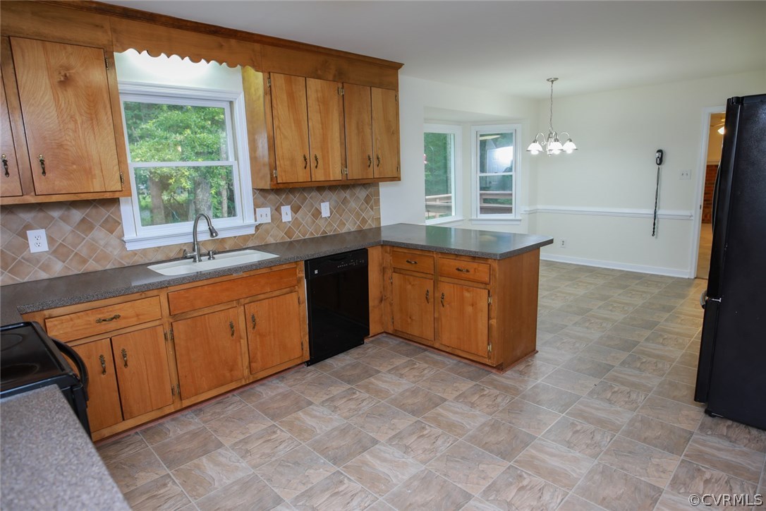 3003 Cove Ridge Road Midlothian, VA 23112 - Photo 8 of 33 a kitchen with stainless steel appliances granite countertop a sink stove and cabinets