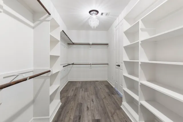 a view of entryway with wooden floor