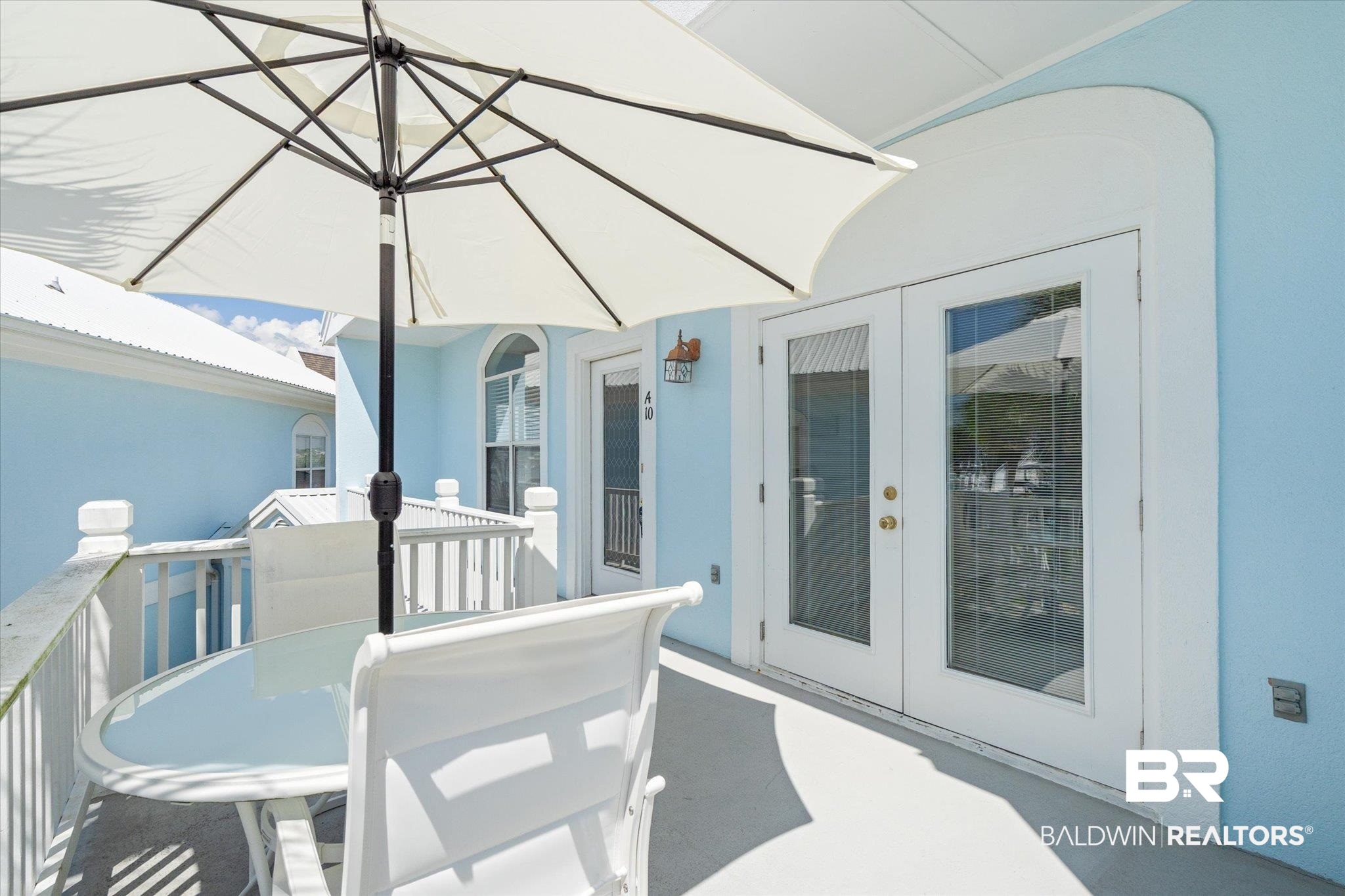 3575 Bayou Road, Unit A 10 Orange Beach, AL 36561 - Photo 5 of 31 View of patio with a balcony and french doors