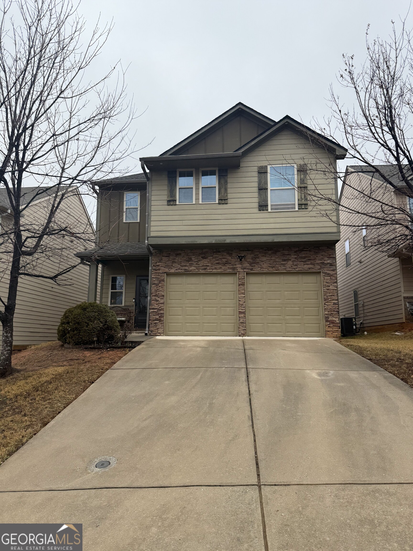 4815 Longview Run Decatur, GA 30035 - Photo 1 of 25 a front view of a house with yard