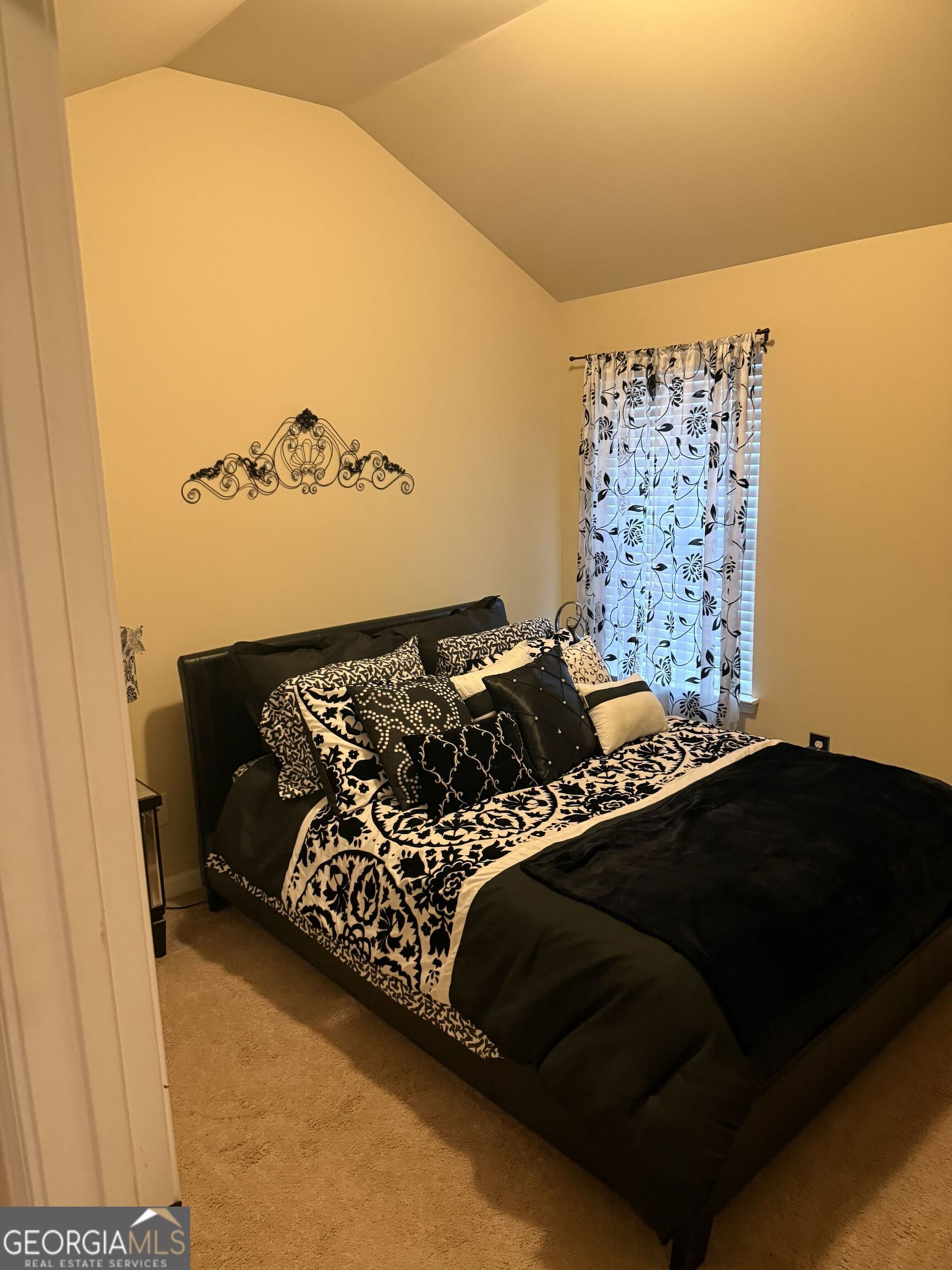 4815 Longview Run Decatur, GA 30035 - Photo 16 of 25 a bedroom with a bed and a wall painting