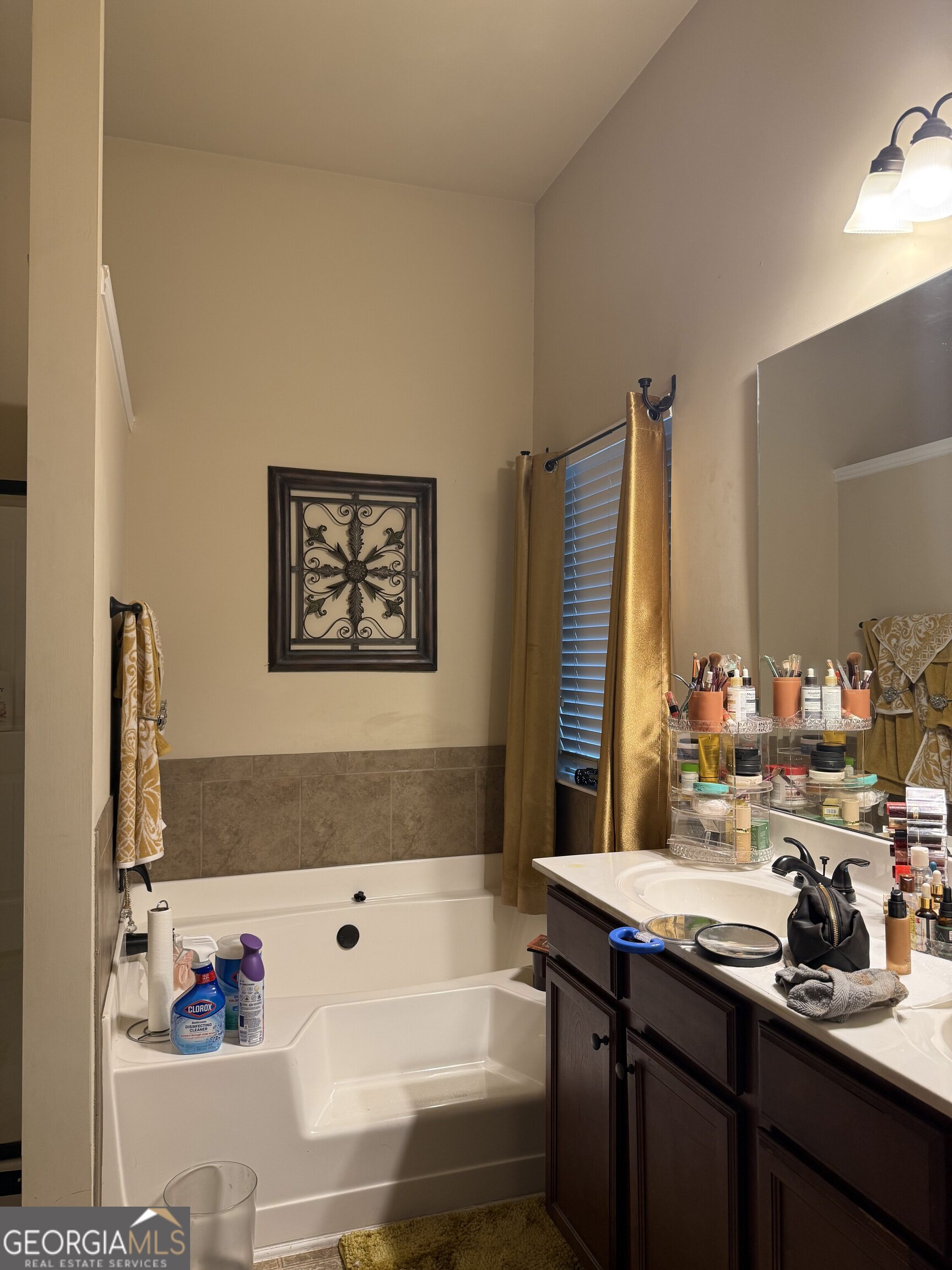 4815 Longview Run Decatur, GA 30035 - Photo 20 of 25 a bathroom with a tub sink and mirror