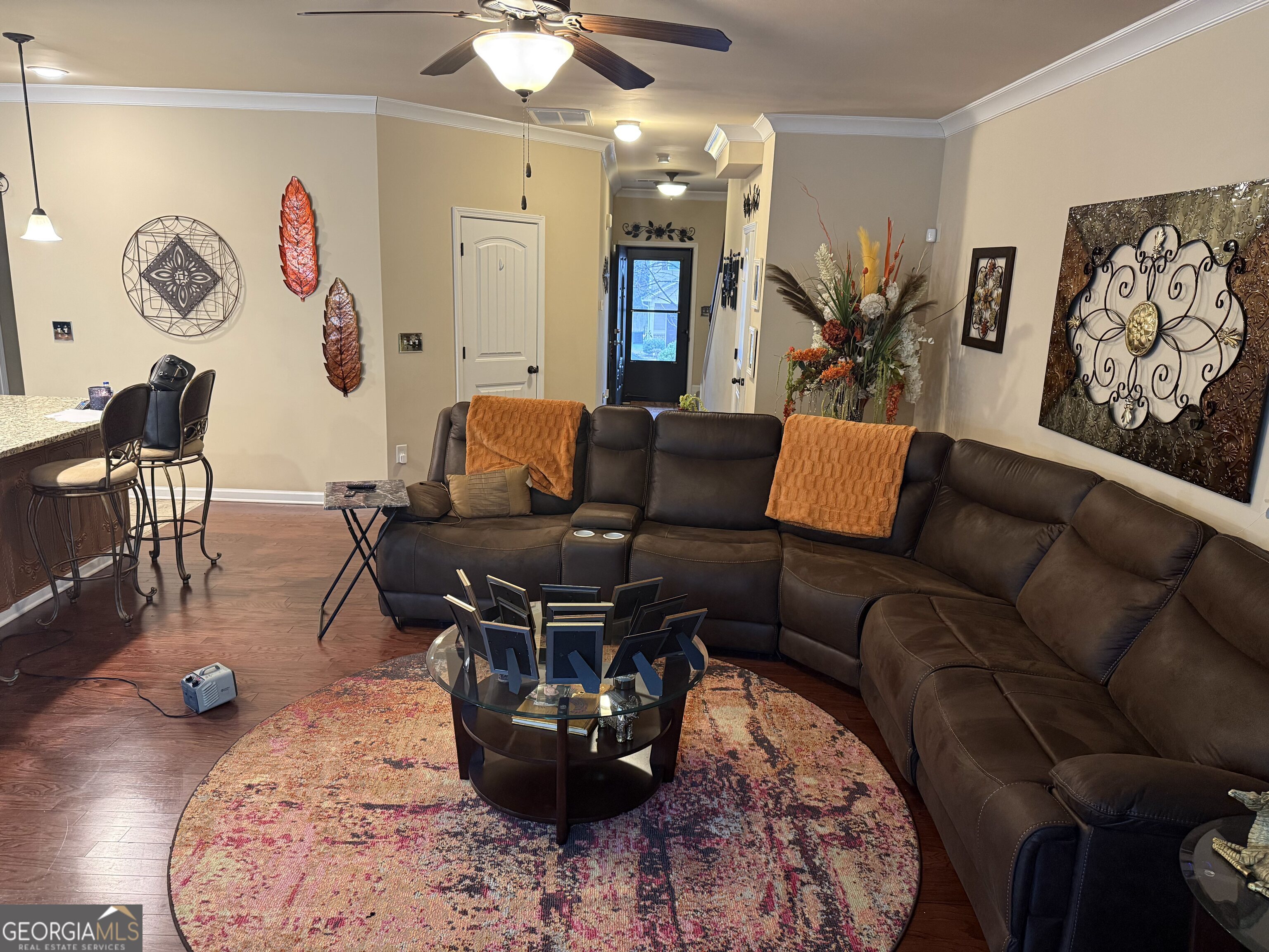 4815 Longview Run Decatur, GA 30035 - Photo 6 of 25 a living room with furniture and a chandelier