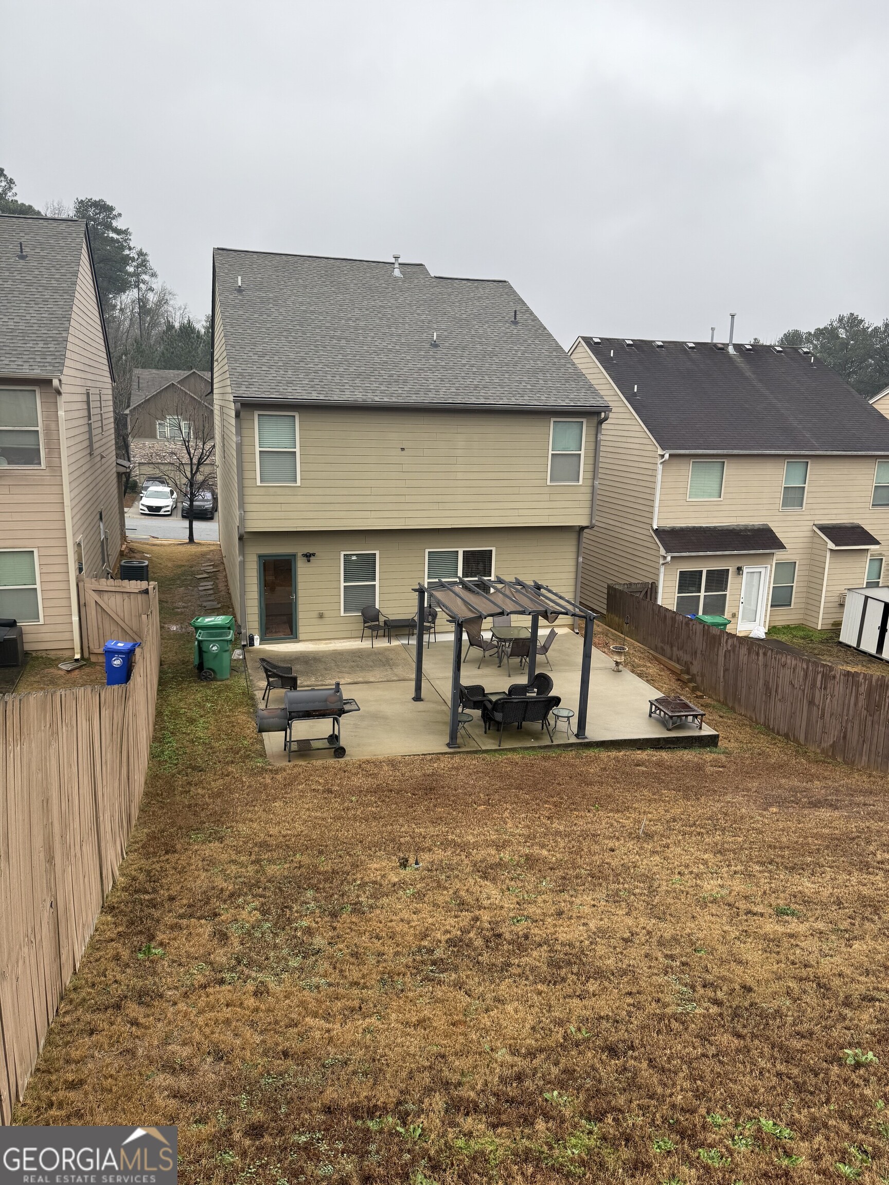 4815 Longview Run Decatur, GA 30035 - Photo 9 of 25 a view of a house with backyard porch and sitting area