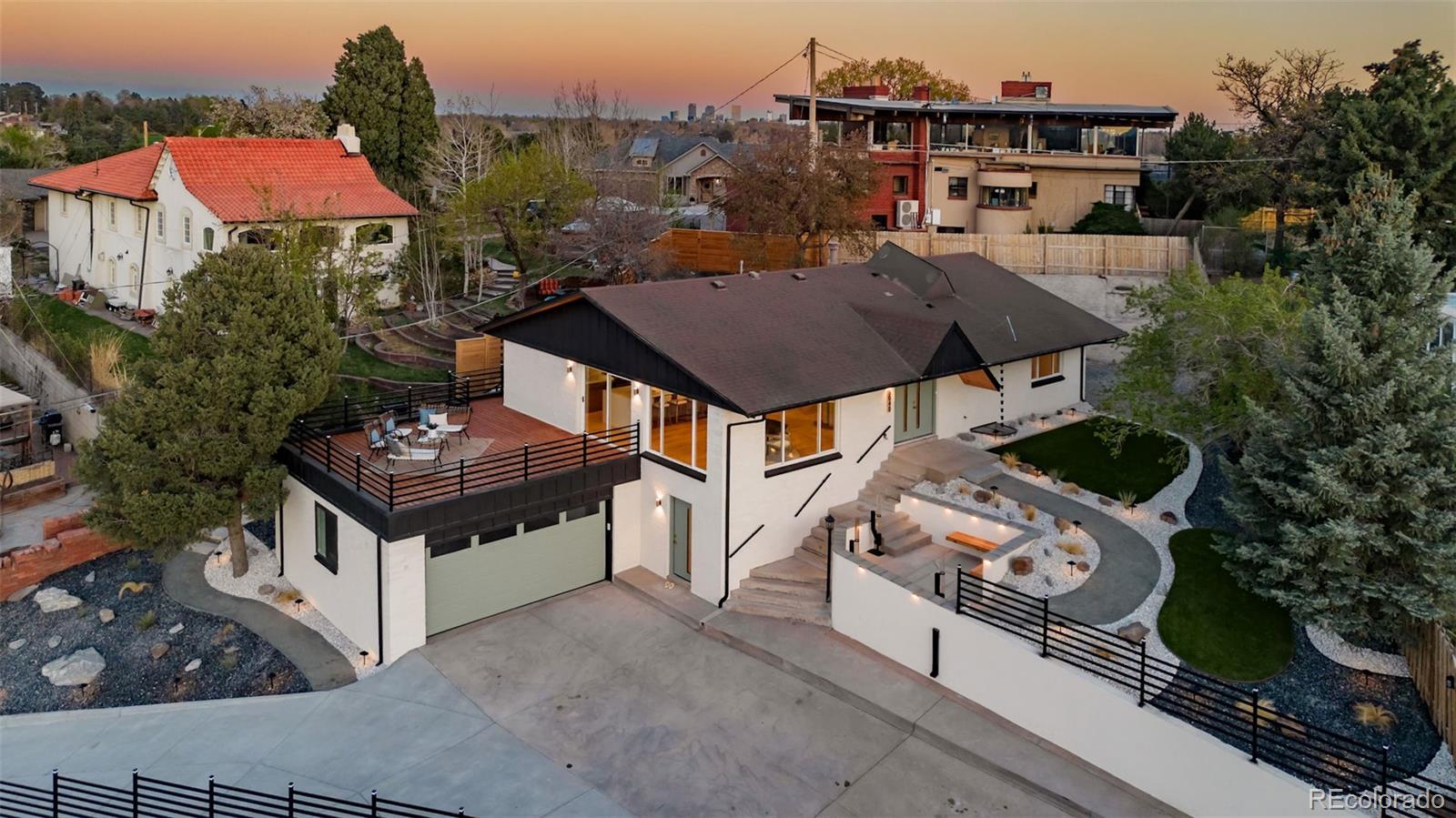 a aerial view of a house with a yard