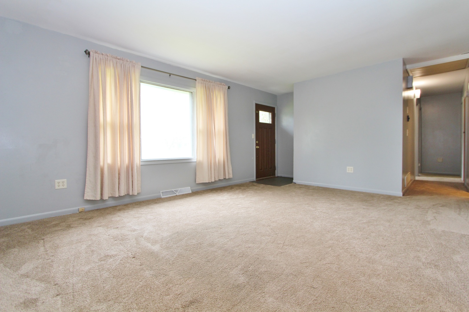 1222 Susan Circle Morris, IL 60450 - Photo 4 of 31 a view of an empty room with a window