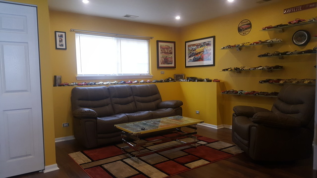 442 Holiday Lane, Unit 402 Round Lake, IL 60073 - Photo 17 of 17 a living room with furniture and a window