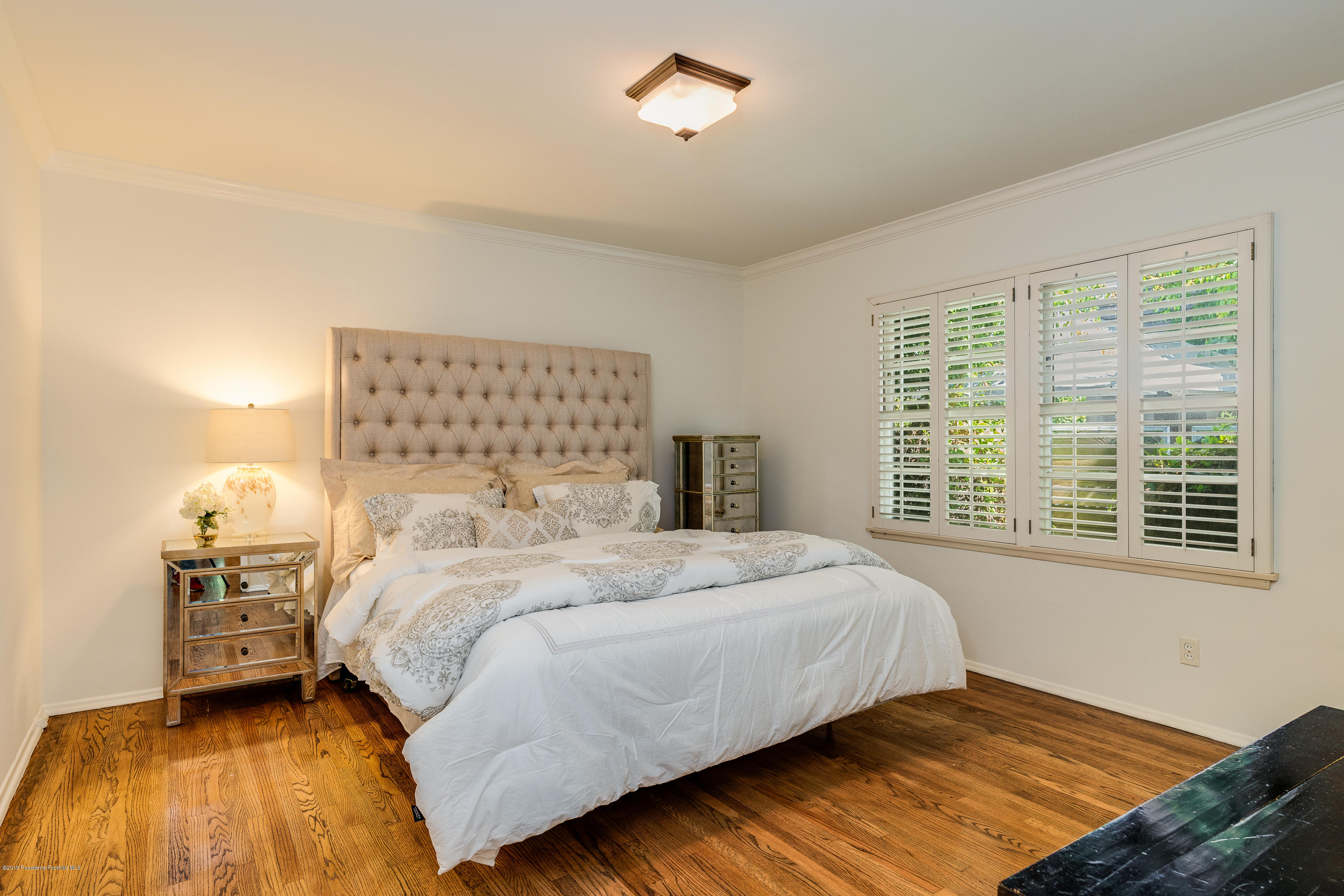2925 Lorain Road San Marino, CA 91108 - Photo 14 of 18 a bedroom with a bed and a window