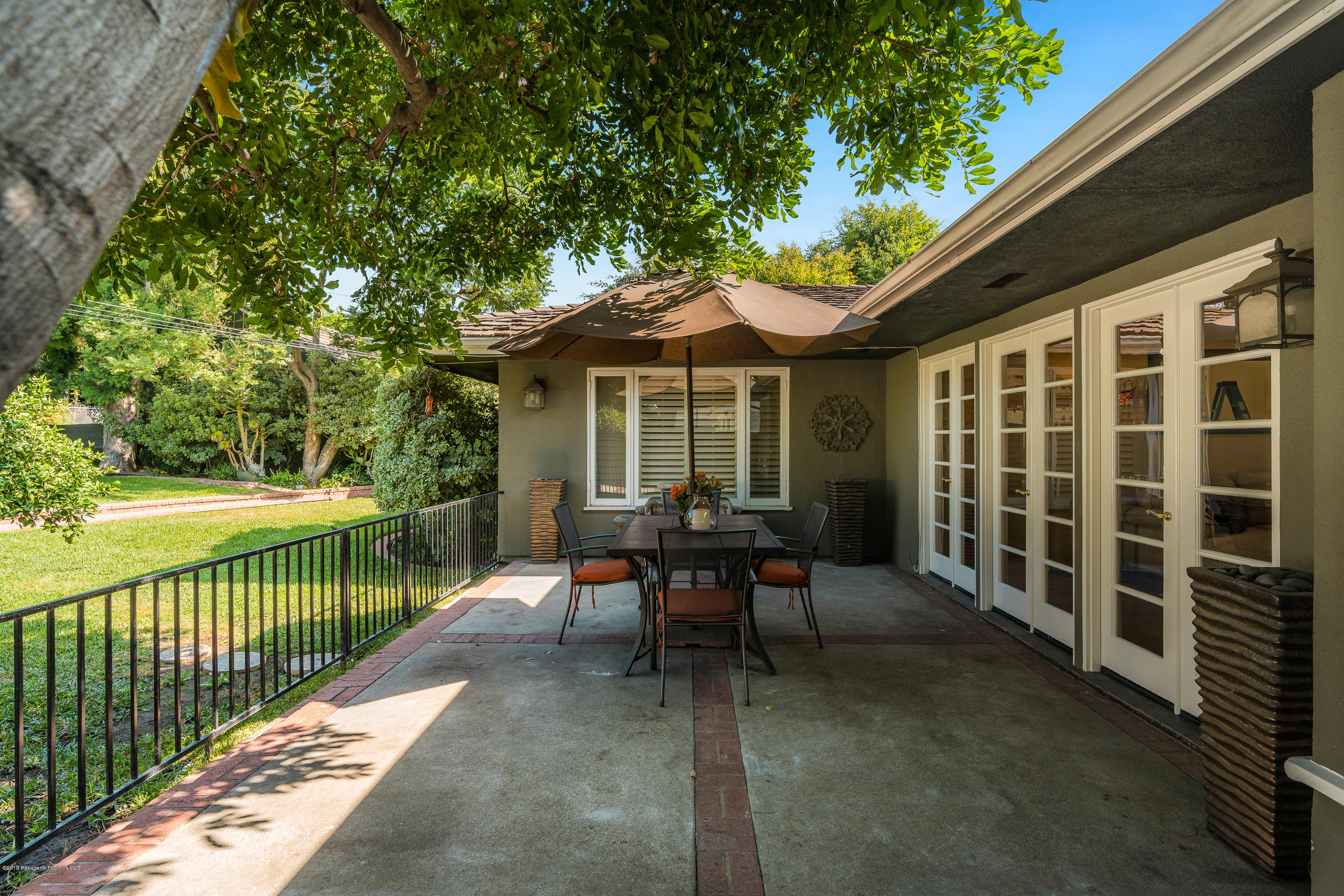 2925 Lorain Road San Marino, CA 91108 - Photo 15 of 18 a view of a house with backyard and sitting area