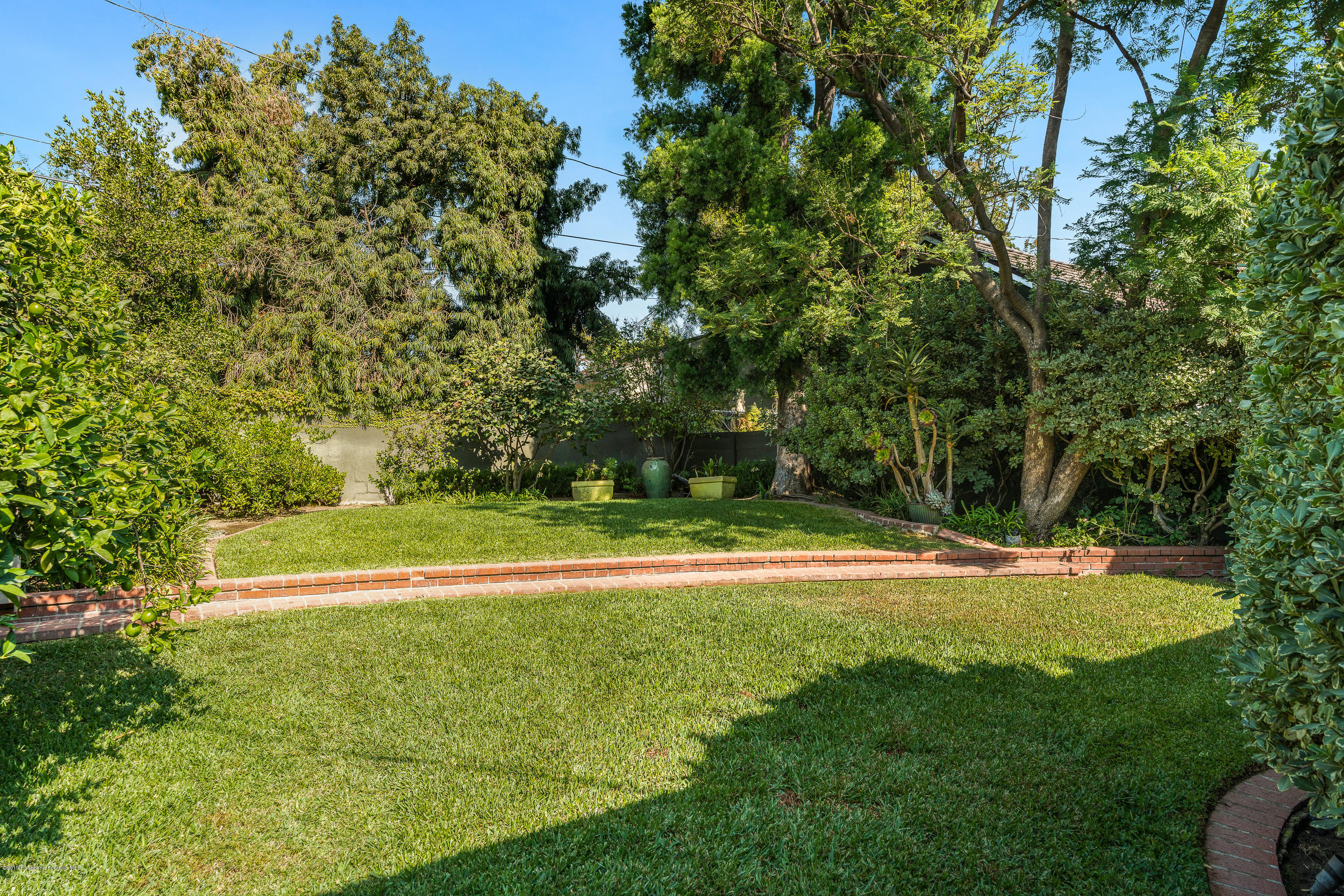 2925 Lorain Road San Marino, CA 91108 - Photo 16 of 18 a view of a golf course with a trees
