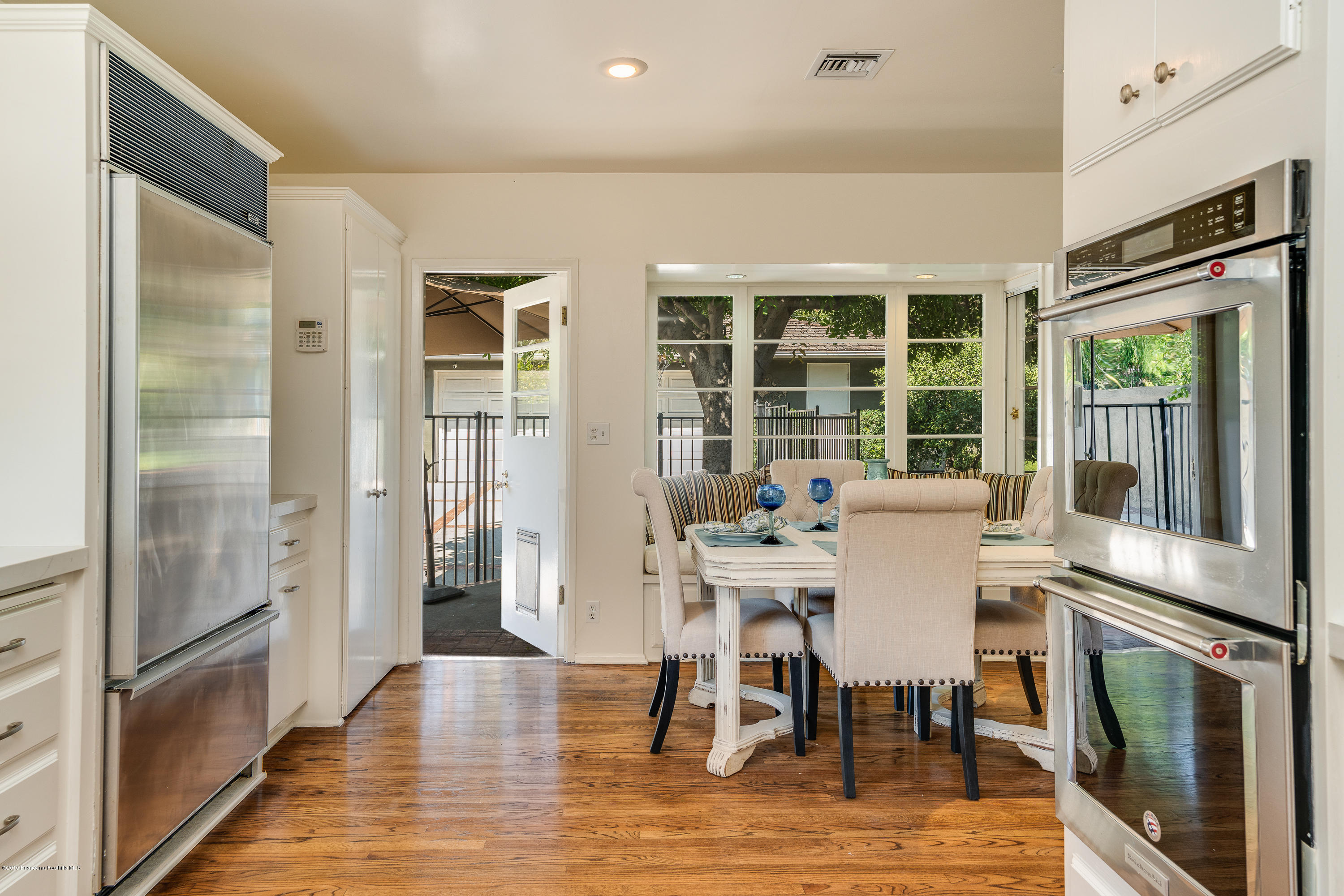 2925 Lorain Road San Marino, CA 91108 - Photo 5 of 18 a view of a dining room with furniture window and wooden floor