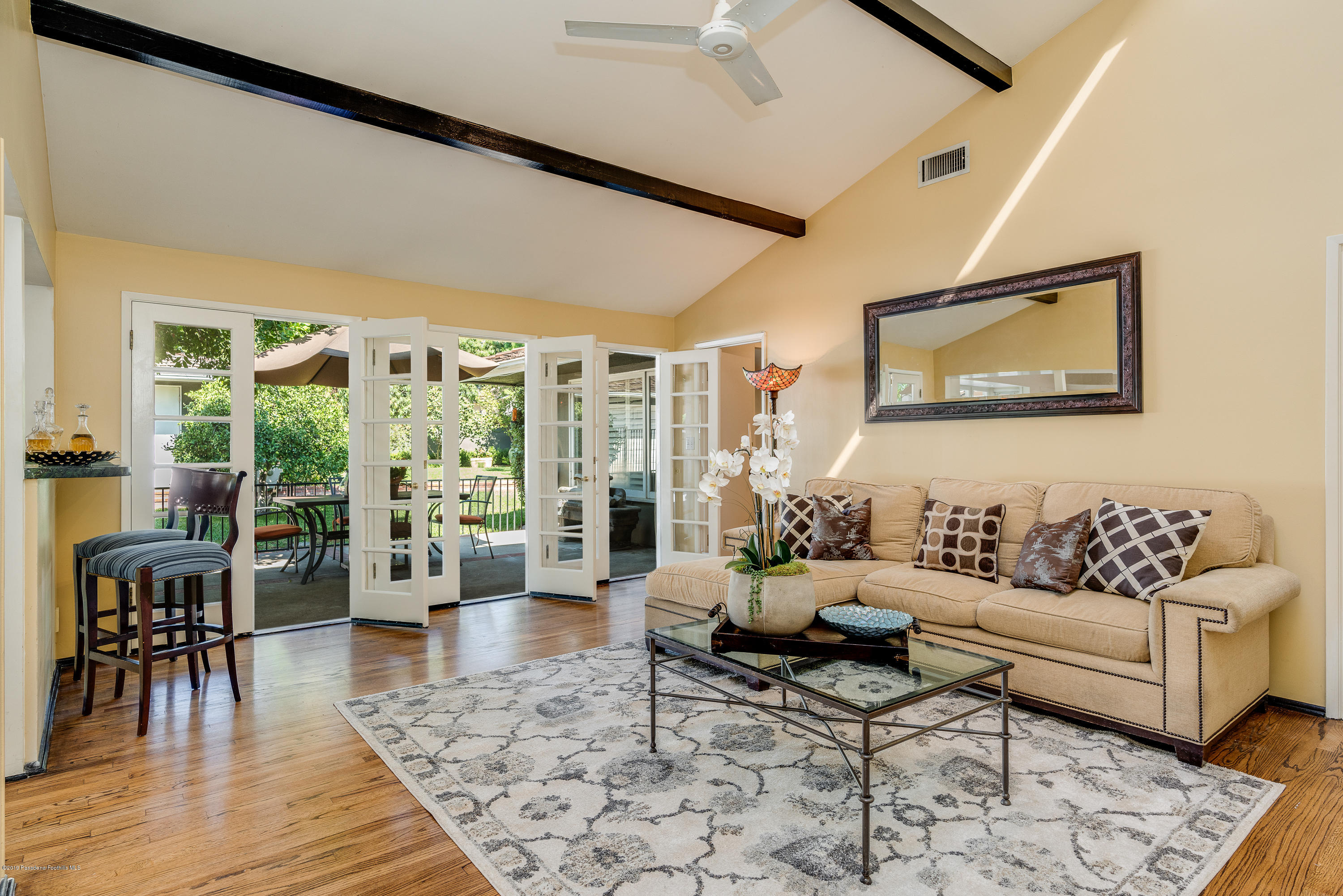 2925 Lorain Road San Marino, CA 91108 - Photo 7 of 18 a living room with furniture and a wooden floor
