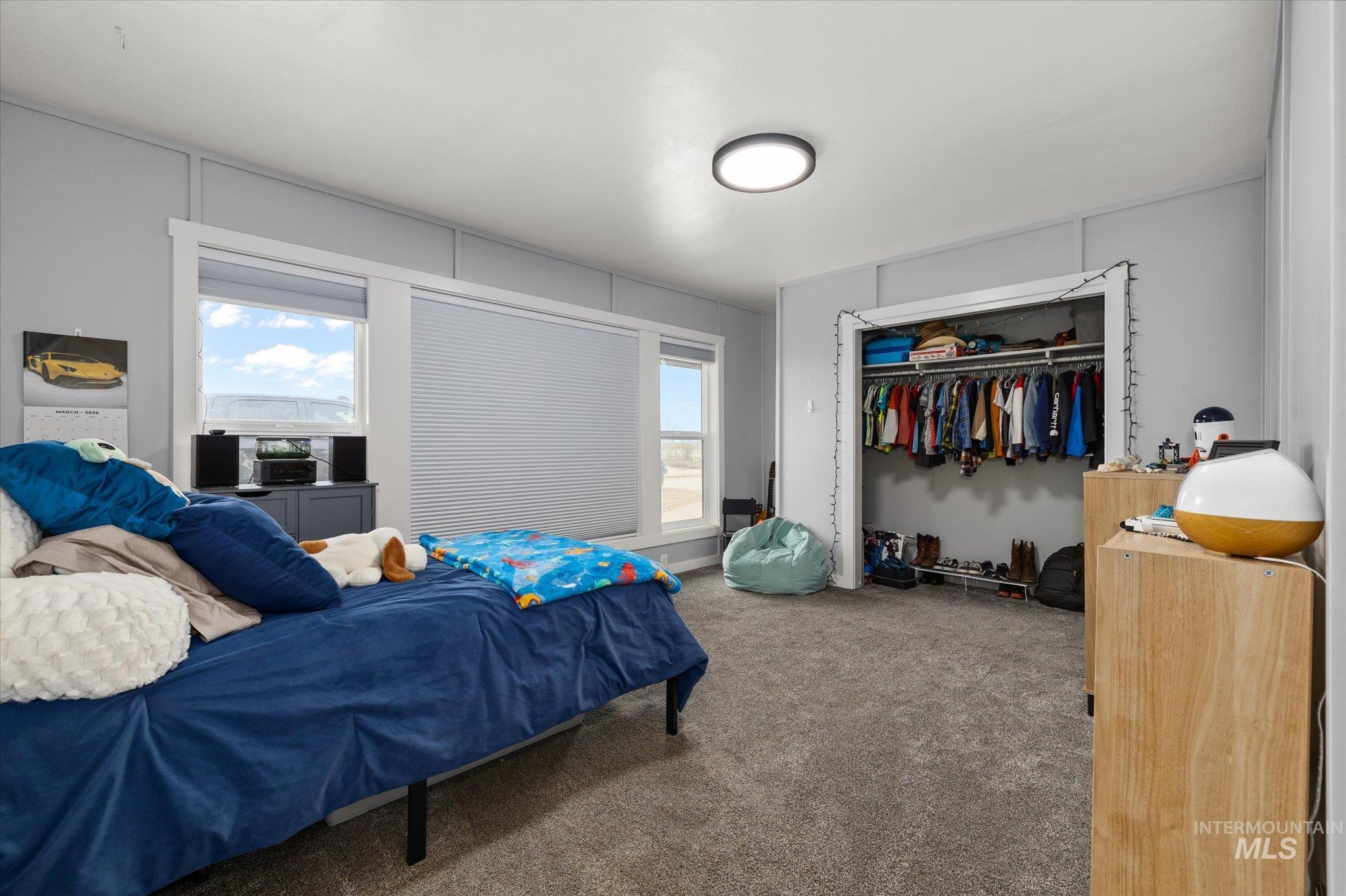 15032 Hollow Road Caldwell, ID 83607 - Photo 30 of 50 Bedroom with carpet flooring and a closet