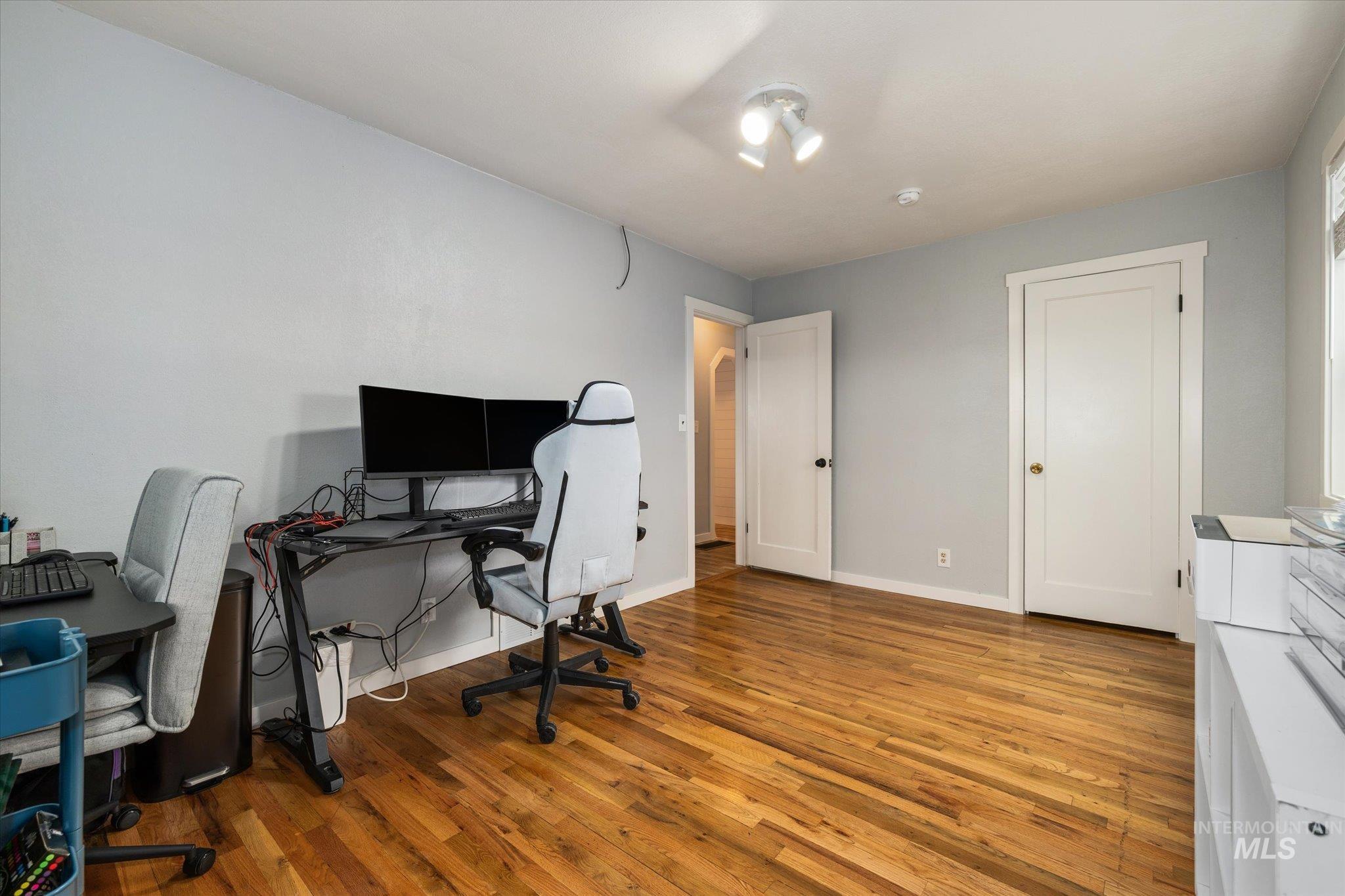 15032 Hollow Road Caldwell, ID 83607 - Photo 33 of 50 Office space featuring light wood finished floors and baseboards