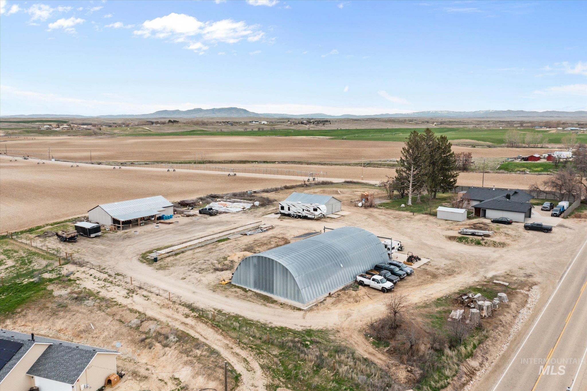 15032 Hollow Road Caldwell, ID 83607 - Photo 9 of 50 Overview of rural landscape featuring a mountainous background