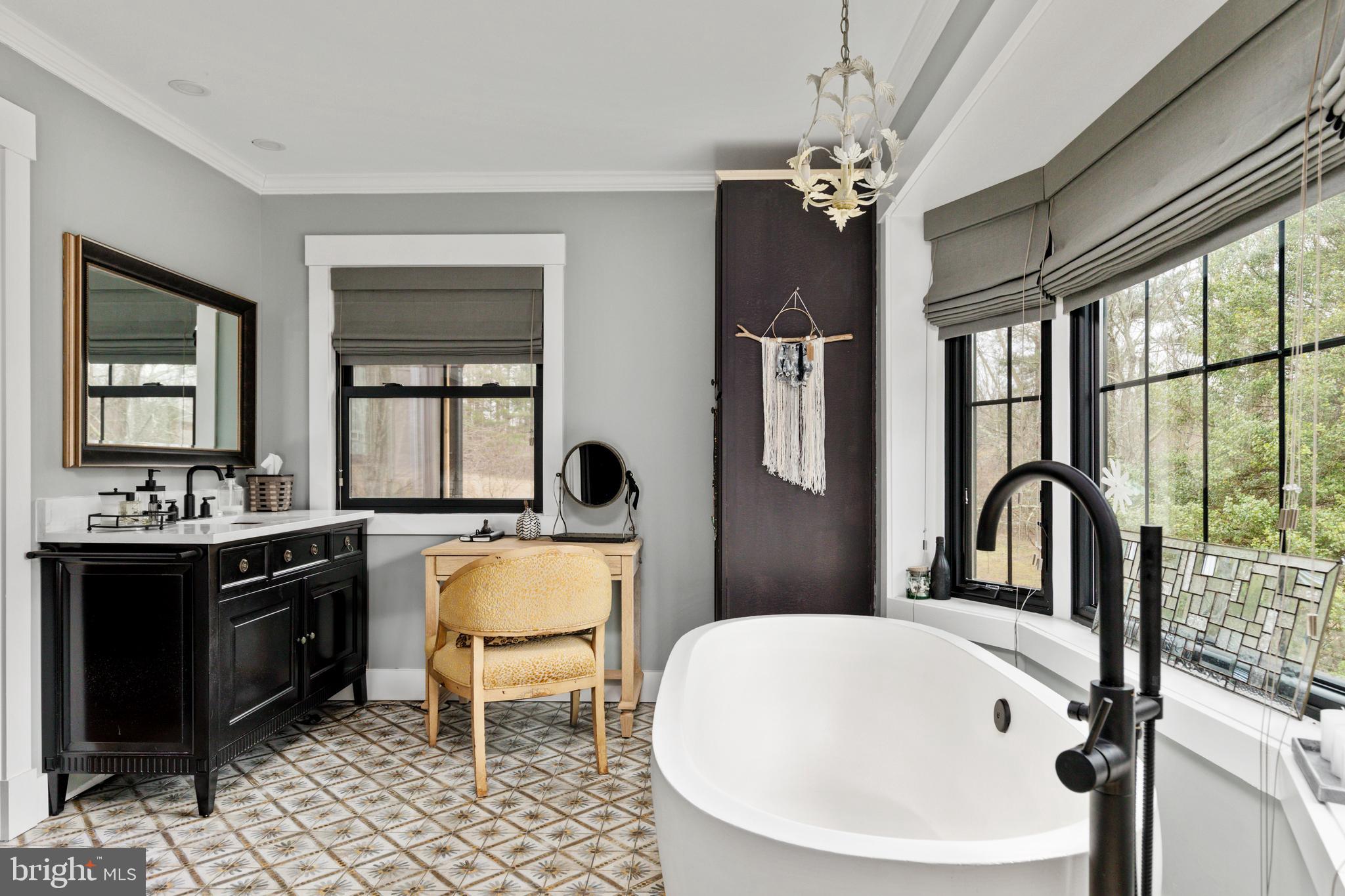 7464 Wilson Road Warrenton, VA 20186 - Photo 11 of 22 a bathroom with a tub sink and mirror
