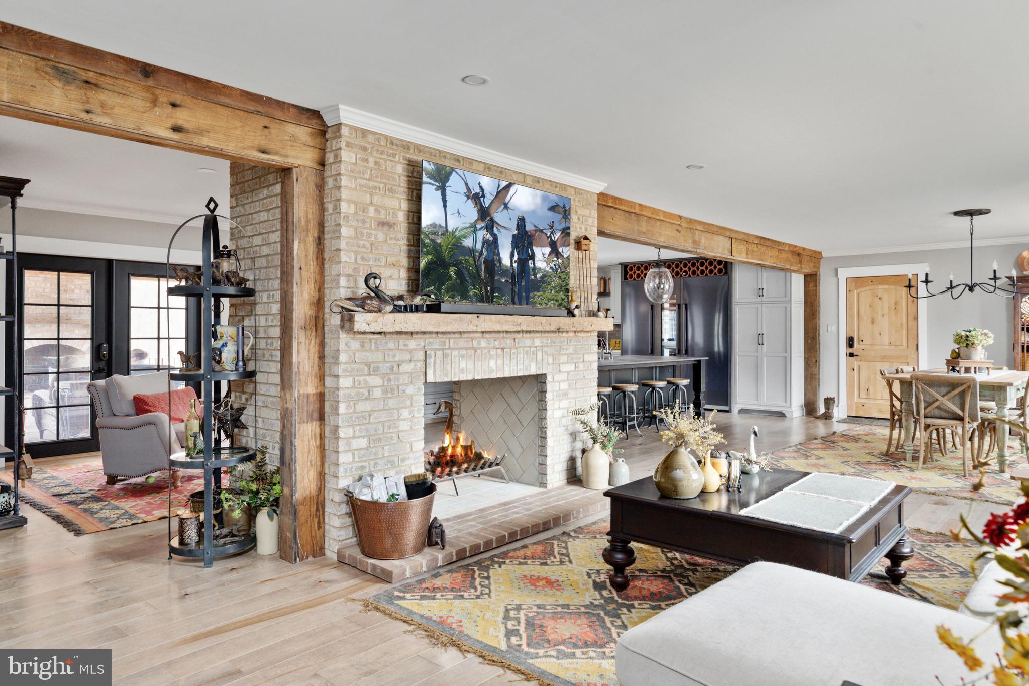 7464 Wilson Road Warrenton, VA 20186 - Photo 4 of 22 a living room with furniture large window and wooden floor