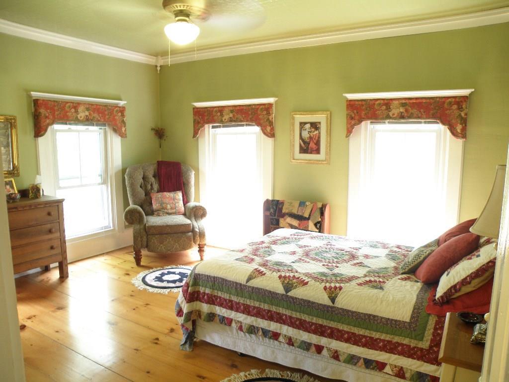 197 Tannery Loop Ellsworth, ME 04605 - Photo 13 of 34 Another 2nd flr BR- bright & cheery