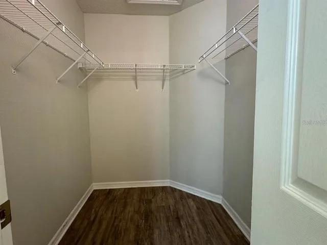 a view of a room with racks on the wall