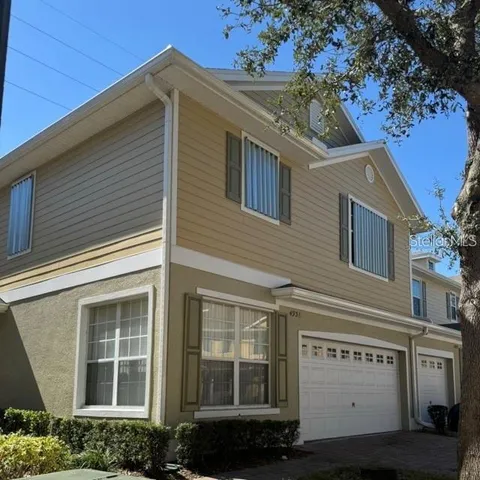 a view of a house with a garage