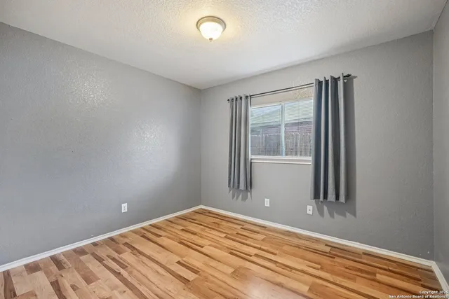 a bathroom with a sink a toilet and bathtub