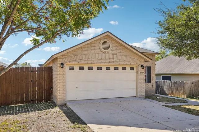 a view of a swimming pool with a lounge chair