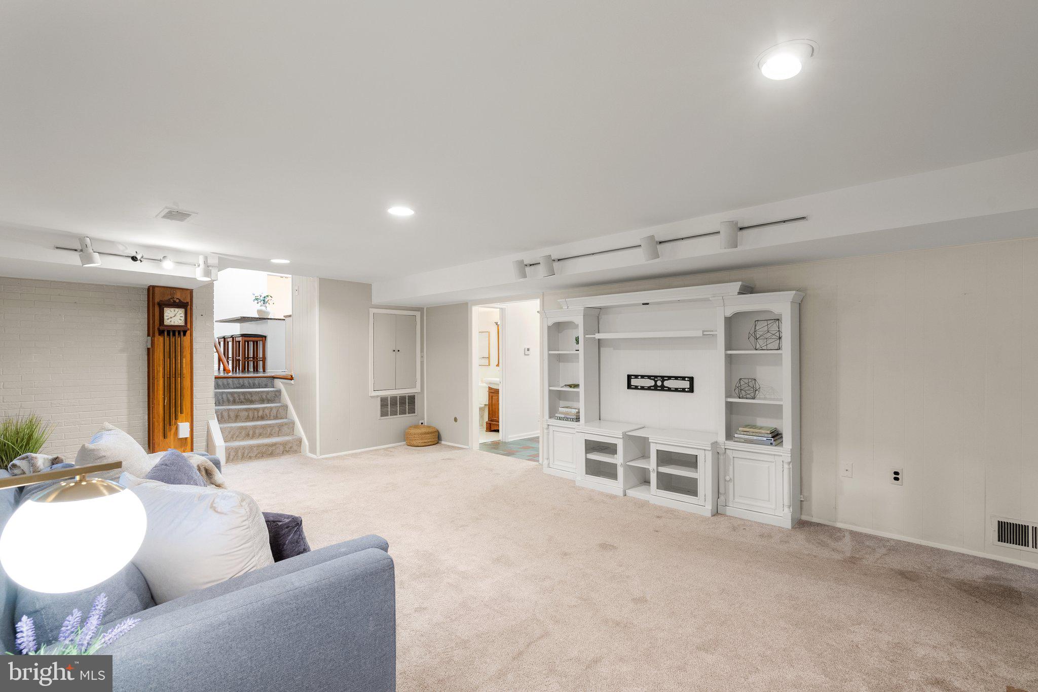 200 Eldrid Drive Silver Spring, MD 20904 - Photo 17 of 44 a living room with furniture and a kitchen