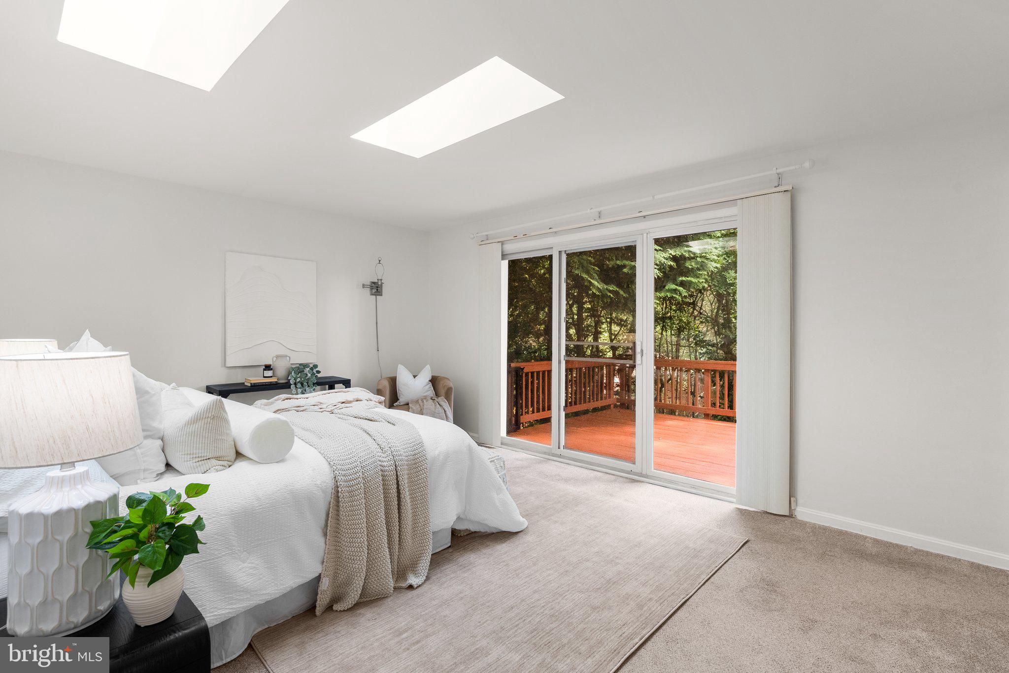 200 Eldrid Drive Silver Spring, MD 20904 - Photo 21 of 44 a spacious bedroom with a bed and a window