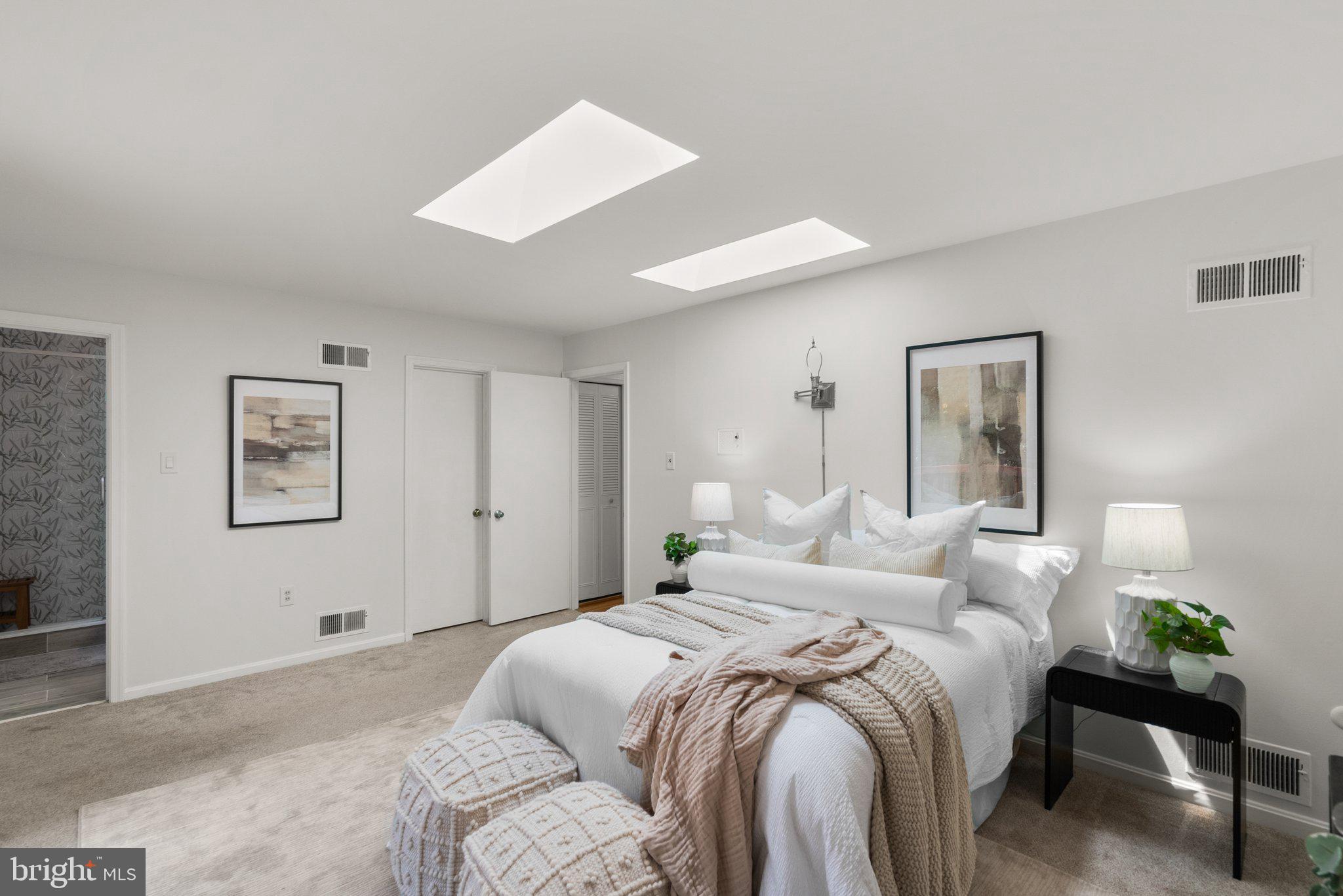 200 Eldrid Drive Silver Spring, MD 20904 - Photo 23 of 44 a bedroom with a bed and a painting on the wall