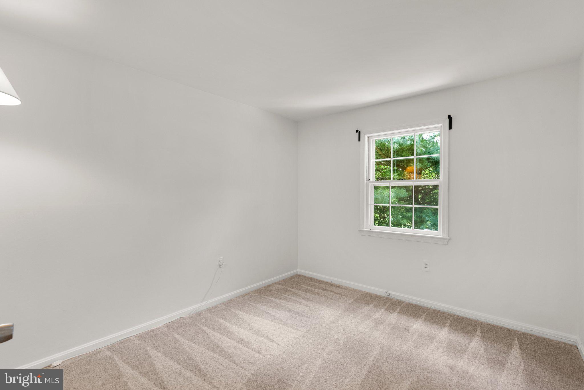 200 Eldrid Drive Silver Spring, MD 20904 - Photo 29 of 44 an empty room with a window