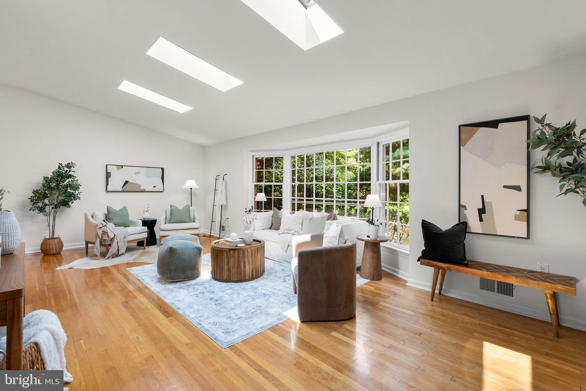 200 Eldrid Drive Silver Spring, MD 20904 - Photo 5 of 44 a living room with furniture large window and wooden floor