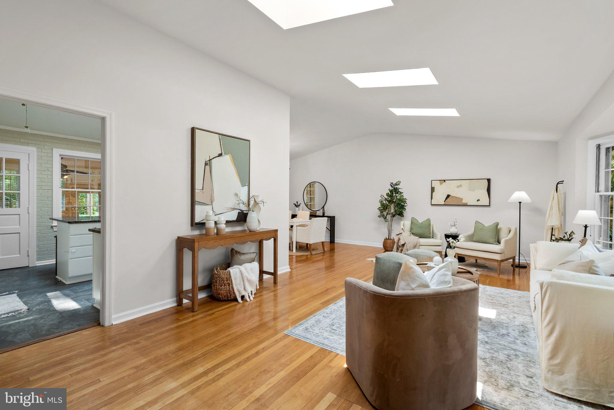 200 Eldrid Drive Silver Spring, MD 20904 - Photo 6 of 44 a living room with furniture and a wooden floor