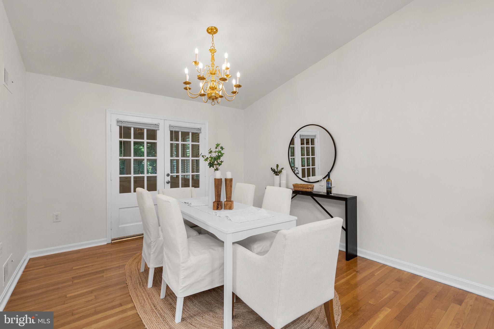 200 Eldrid Drive Silver Spring, MD 20904 - Photo 8 of 44 a view of a dining room with furniture and wooden floor
