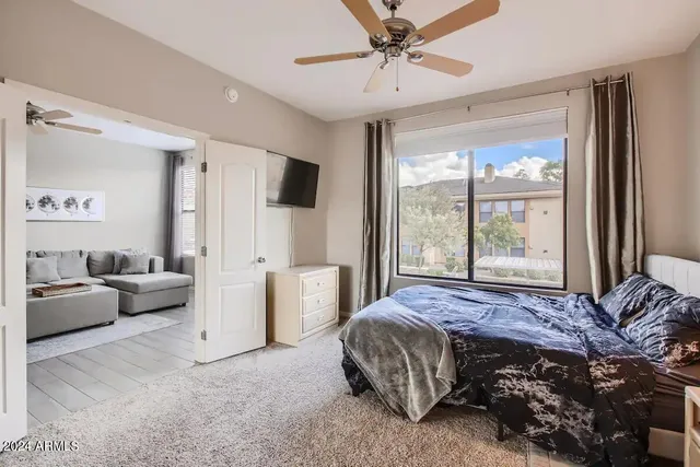 a bed room with a bed and a couch