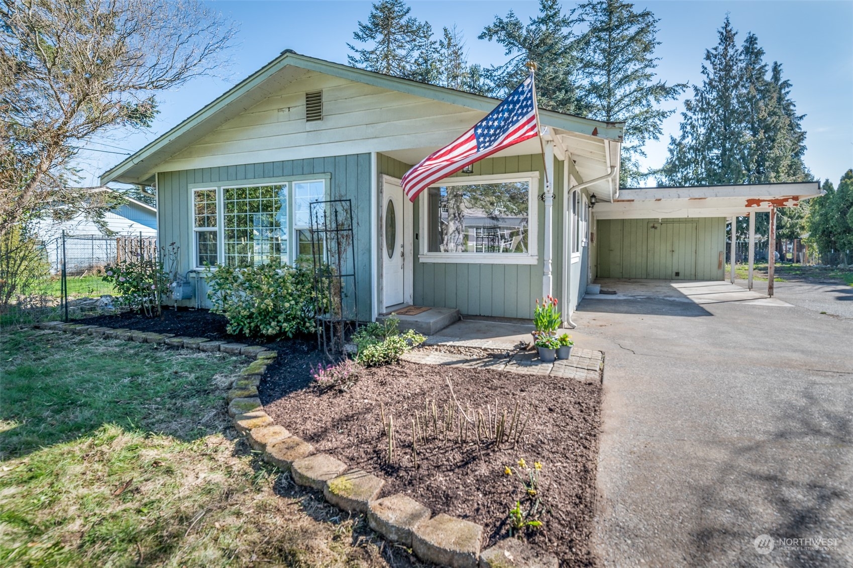 6912 Old Guide Road Lynden, WA 98264 - Photo 1 of 37 a front view of house with yard and green space