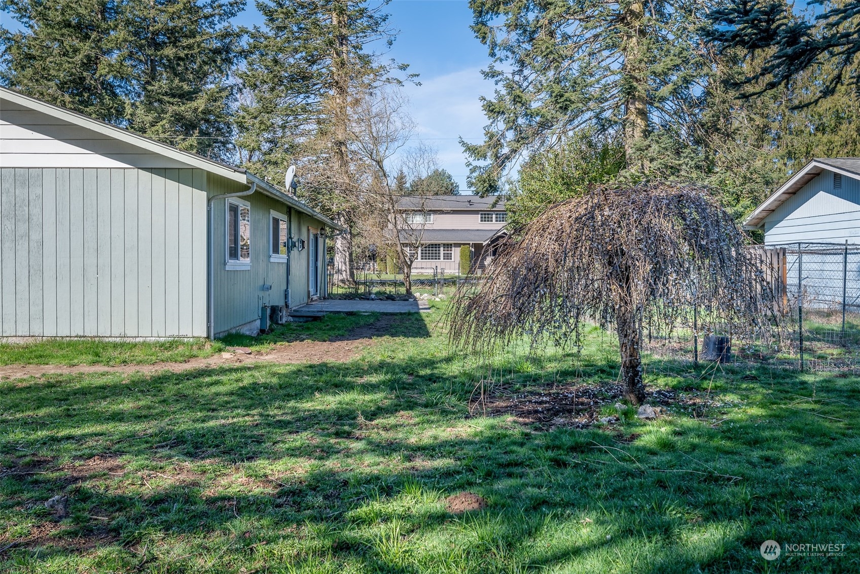 6912 Old Guide Road Lynden, WA 98264 - Photo 21 of 37 a view of a house with a backyard